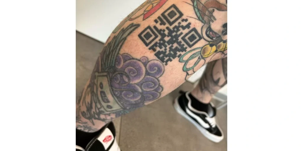 A prank QR Code tattoo on a leg.