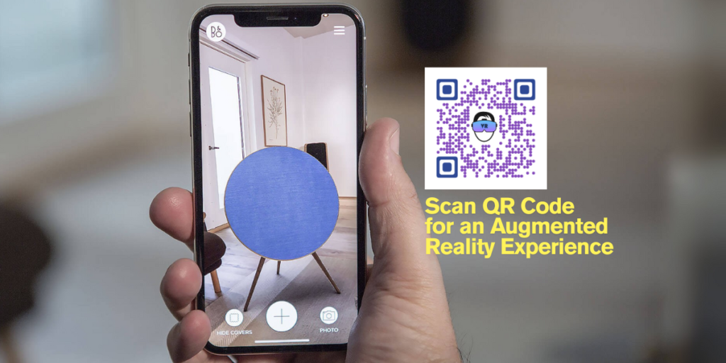 A hand holding a smartphone checking how the furniture will look in the room through  an augmented reality QR Code.