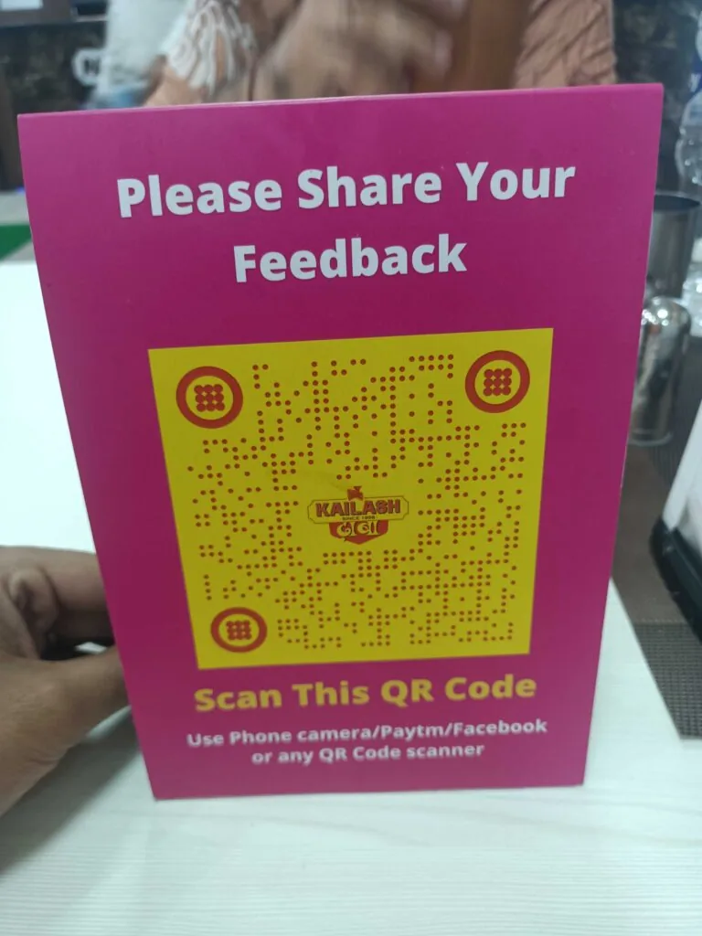 A QR Code for feedback on a table top.