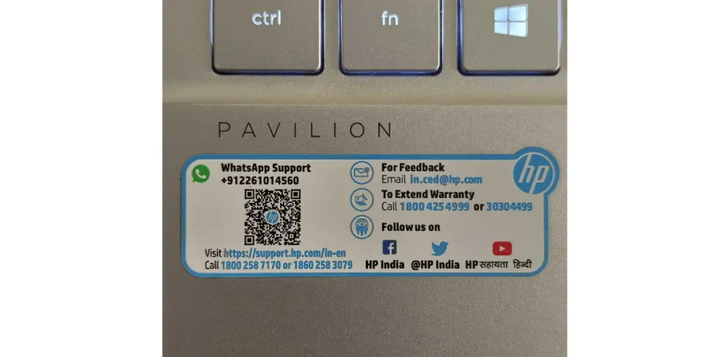 HP using one of the best QR code ideas, with a sticker on a laptop that allows users to directly contact their support team via WhatsApp.