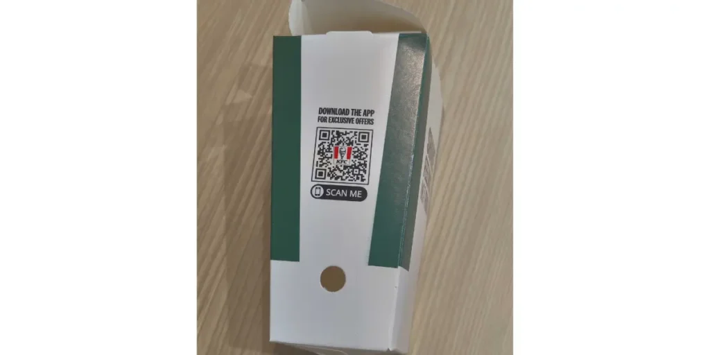 KFC using a QR code on product packaging to boost app downloads.