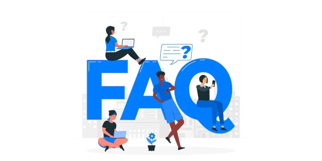 a giant FAQ sign with persons sitting around it