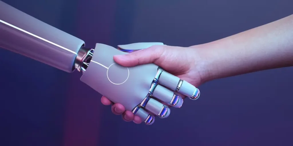 a robot shakes hands with a human