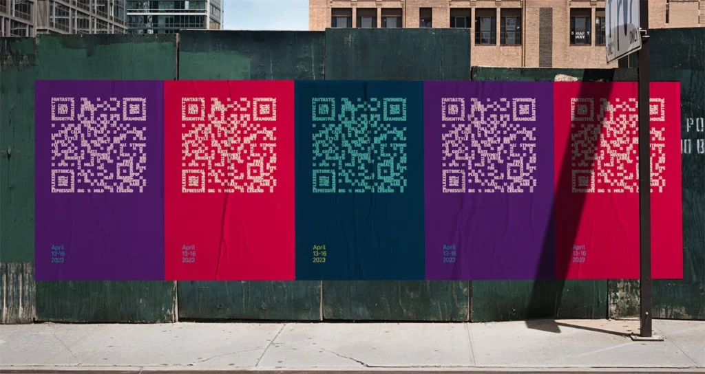 A wall with white QR Code art on it.