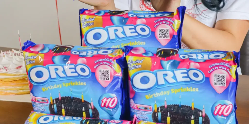 Stack of limited-edition Oreo 110th birthday packs featuring a QR code.