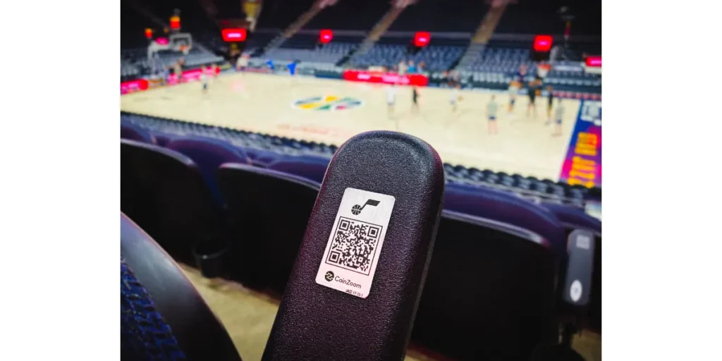 QR code on a stadium chair armrest for convenient access to food, maps, and more.