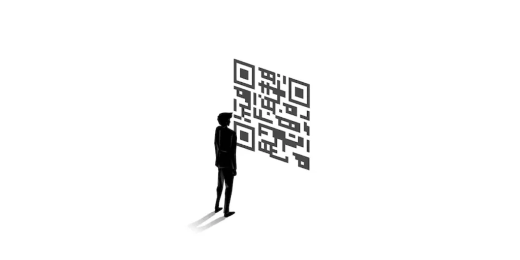 A man  standing in front of a QR Code.