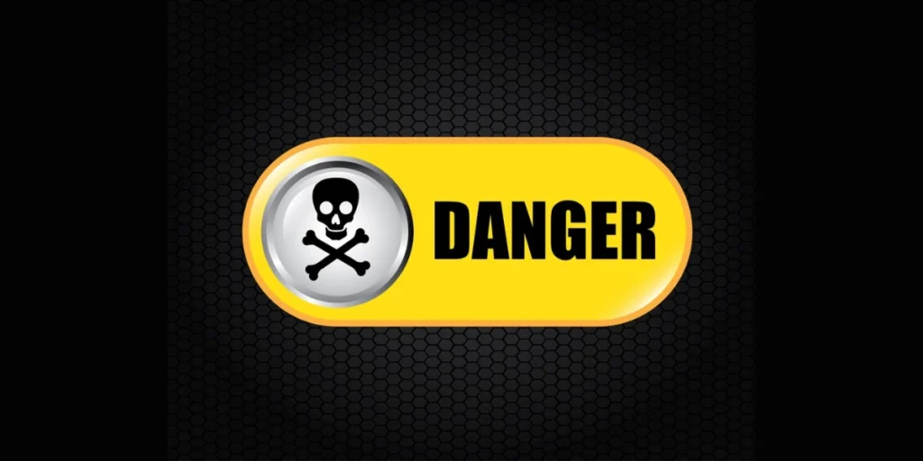 A danger logo on a yellow background, with a black backdrop.