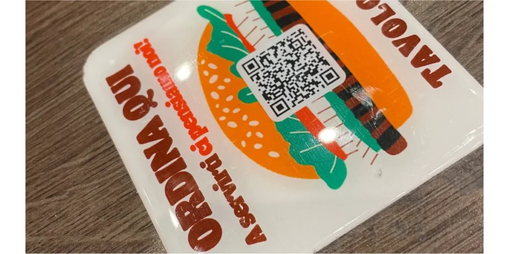 QR Code sticker placed on a table tent in Burger King.