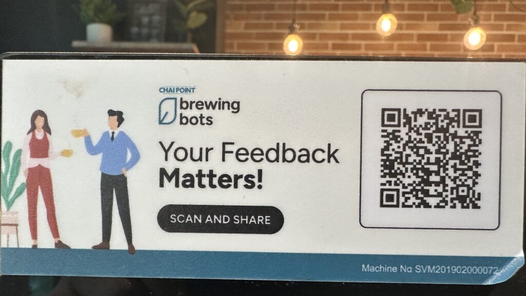 Chai Point ad that says "Your Feedback Matters" with a QR Code on it.