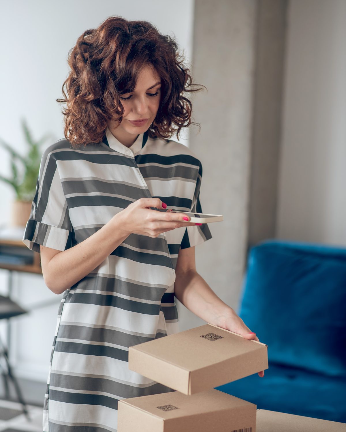 Customer scanning a QR Code on product packaging with a smartphone